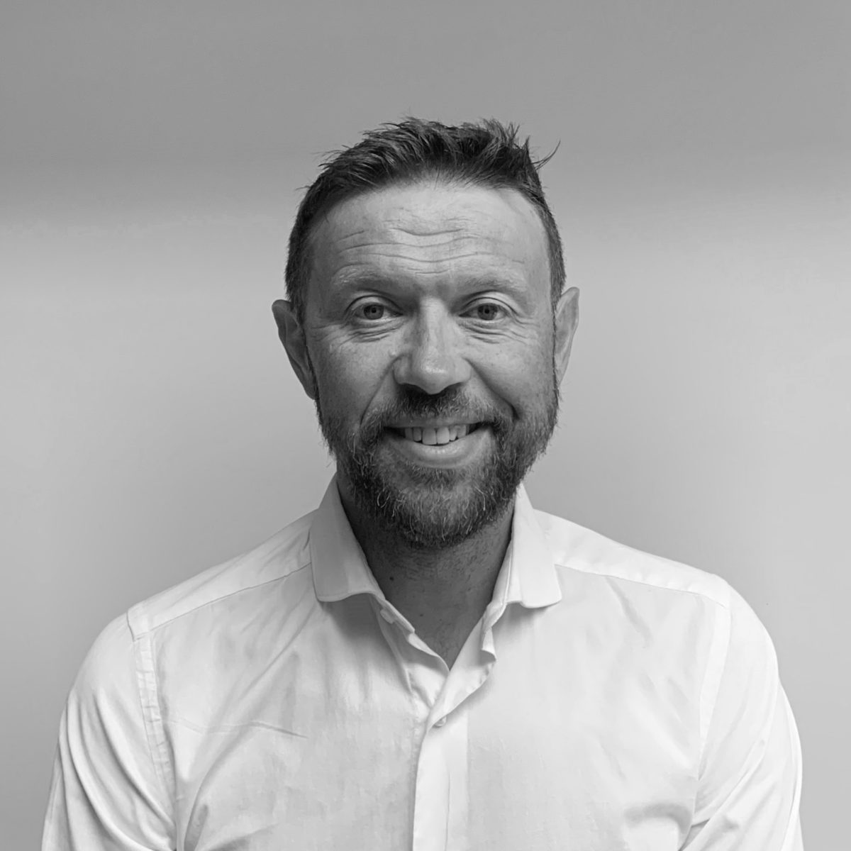 James Dixon headshot black and white